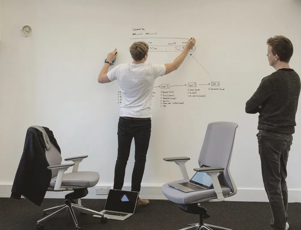 Drawing on whiteboard Sam Dickie